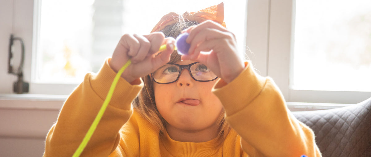 Child with allergies plays with a toy