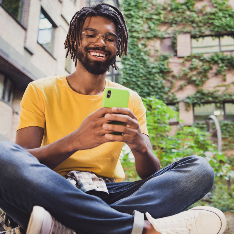 Man with allergies uses his phone